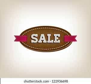 Leather vector promo rough fabric banner decorated with red ribbon tags - "Sale"