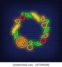 Leaves, apples, acorns, pears, pretzel and ears frame neon sign. Autumn, harvest, decoration design. Night bright neon sign, colorful billboard, light banner. Vector illustration in neon style.