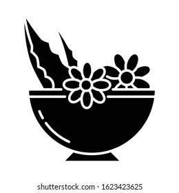 Leaves in bowl black glyph icon. Medicinal herbs and flowers in mortar. Botanical ingredients for organic cosmetology. Natural skincare. Silhouette symbol on white space. Vector isolated illustration