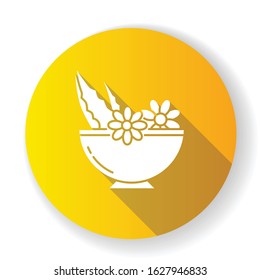 Leaves in bowl yellow flat design long shadow glyph icon. Medicinal herbs and flowers in mortar. Botanical ingredients for organic cosmetology. Natural skincare. Silhouette RGB color illustration