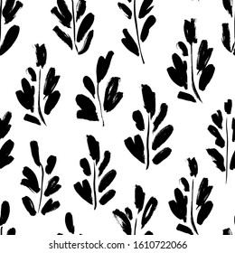 Leaves and branches vector seamless pattern. Organic motif, herbs element painted with a brush. Abstract hand drawn ink background. Rough twig, leaves or sprig. Black and white grunge ornament
