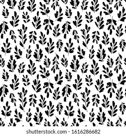 Leaves and branches vector seamless pattern. Organic motif, herbs element painted with a brush. Abstract hand drawn ink background. Rough twig, leaves or sprig. Black and white grunge ornament