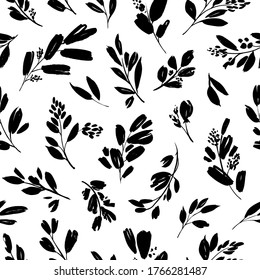 Leaves and branches vector seamless pattern. Black brush leaves, twigs and small flowers. Black branch modern ornament, ink texture with foliage. Hand drawn eucalyptus twig. Abstract plant motif