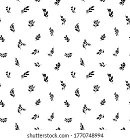 Leaves and branches vector seamless pattern. Black brush leaves, twigs and small flowers. Black branch modern ornament, ink texture with foliage. Hand drawn eucalyptus twig. Abstract plant motif