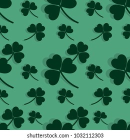 The leaves of clover background. Simple seamless modern pattern for St. Patrick's Day in green tones. Vector illustration.