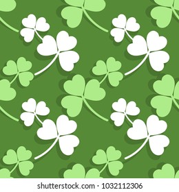The leaves of clover background. Simple seamless modern pattern for St. Patrick's Day in green tones. Vector illustration.