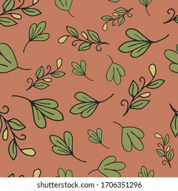 Leaves hand drawn color vector seamless pattern. Cartoon leafage flat illustration. Decorative textile, wallpaper, wrapping paper design idea. Green foliage on orange background.