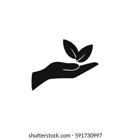 Leaves in a hand sign of environmental protection icon. Eco sign. vector illustration.