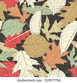 leaves on a black background in seamless pattern