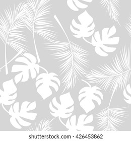 Leaves of palm tree. Seamless pattern. Vector gray background.