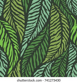 Leaves of palm tree. Seamless pattern. Vector background.