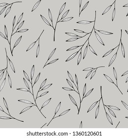 Leaves pattern. Black and white leaves on gray background.