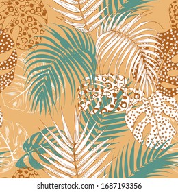 leaves of the tropical palms with animal print seamless vector illustration