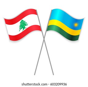 Lebanese and Rwandan crossed flags. Lebanon combined with Rwanda isolated on white. Language learning, international business or travel concept.