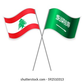 Lebanese and Saudi Arabian crossed flags. Lebanon combined with Saudi Arabia isolated on white. Language learning, international business or travel concept.