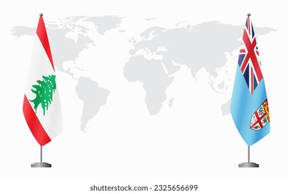 Lebanon and Fiji flags for official meeting against background of world map.