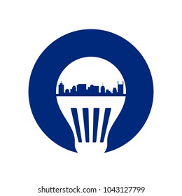 led bulb lamp vector logo. nashville tennessee skyline.