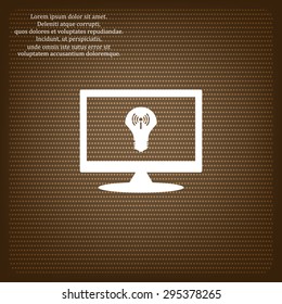 LED lamp controlled via wi-fi network icon on computer screen