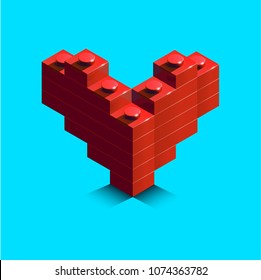 Lego heart. Realistic 3d red heart from building bricks on blue background. 3d heart 