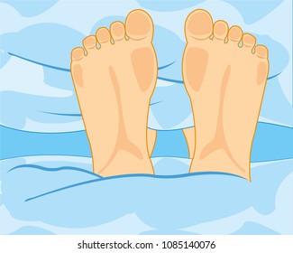 Legs of the person from under blankets