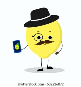 Lemon hipster in a hat and with a phone.