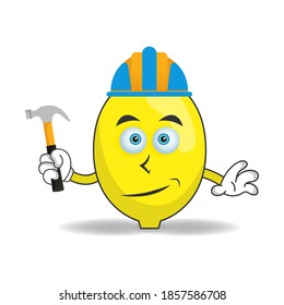 The Lemon mascot character becomes a builder. vector illustration