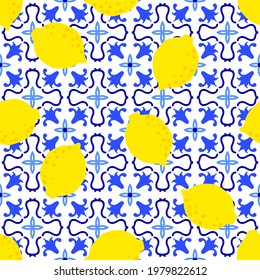 Lemon pattern. Citrus fruit on ceramic tile pattern made in Mediterranean style inspired by Portuguese, Sicilian and Spanish tile traditional design. Vector seamless blue yellow background. 