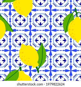 Lemon pattern. Citrus fruit on ceramic tile pattern made in Mediterranean style inspired by Portuguese, Sicilian and Spanish tile traditional design. Vector seamless blue yellow background. 