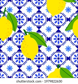 Lemon pattern. Citrus fruit on ceramic tile pattern made in Mediterranean style inspired by Portuguese, Sicilian and Spanish tile traditional design. Vector seamless blue yellow background. 