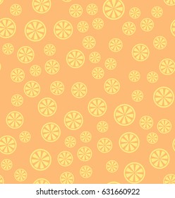 Lemon pattern. Seamless vector background: yellow citruses on peach backdrop