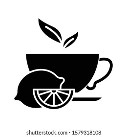 Lemon tea glyph icon. Common cold aid. Healthcare. Aromatic teacup. Hot drink in cup. Antioxidant with vitamin C. Beverage to relax. Silhouette symbol. Negative space. Vector isolated illustration