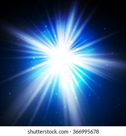 Lens flare. Flash bright spotlight on a dark blue background and the rays of glare.