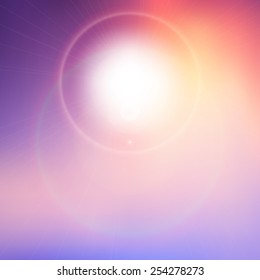 Lens flare on beautiful blurred purple background