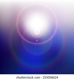 Lens flare on blue blurred background