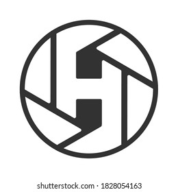 Eine Linse mit "H"-Buchstaben 
