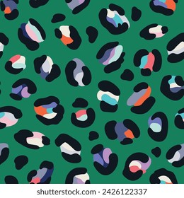 Leo seamless pattern. Random placed, abstract multi colored shapes, wildcat skin imitate. Animal skin all over surface print for fabric, paper, package. Leopard vector background. Modern wallpaper