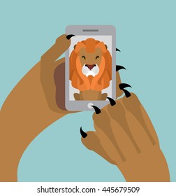 Leo selfie. Lion photographed themselves on phone. Angry wild animal and smartphone
