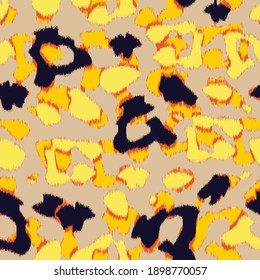 Leopard animal print in muted tie dye hues of yellow, orange, navy . Seamless repeating pattern.