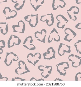 Leopard heart seamless pattern. Vector animal print. Blue spots on light beige background. Jaguar, leopard, cheetah, panther fur. Leopard skin imitation can be painted on clothes or fabric.