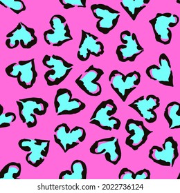 Leopard heart seamless pattern. Vector animal print. Black and turquoise spots on pink background. Jaguar, leopard, cheetah, panther fur. Leopard skin imitation can be painted on clothes or fabric.