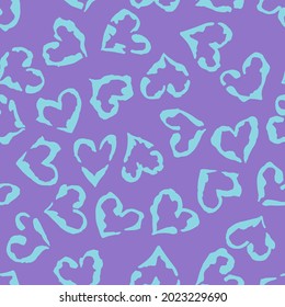 Leopard heart seamless pattern. Vector animal print. Light blue spots on violet background. Jaguar, leopard, cheetah, panther fur. Leopard skin imitation can be painted on clothes or fabric.