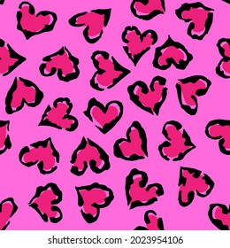 Leopard heart seamless pattern. Vector animal print. Black and magenta spots on pink background. Jaguar, leopard, cheetah, panther fur. Leopard skin imitation can be painted on clothes or fabric.