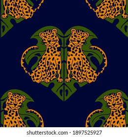 Leopard and monstera leaf seamless vector pattern. Tropical background 