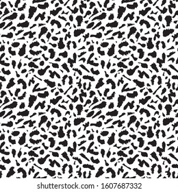 Leopard pattern black and white. Monochrome. Print for fabric and design. Black spots on a white background.