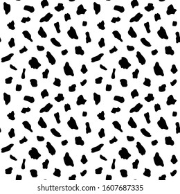 Leopard pattern black and white. Monochrome. Print for fabric and design. Black spots on a white background.
