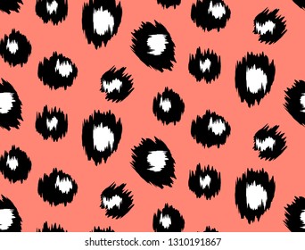 Leopard pattern on a coral background. Seamless background. Color of the year 2019 - living coral.