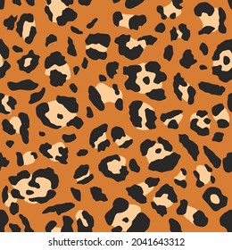 Leopard pattern. Trendy seamless vector texture. Animal print. Black spots on orange background. Cheetah skin imitation for painted on clothes or fabric.