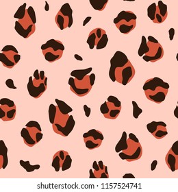 leopard print animal design. brown, orange and peach colors. hand drawn seamless pattern for bed linen, jacket, package design, fabric and fashion.