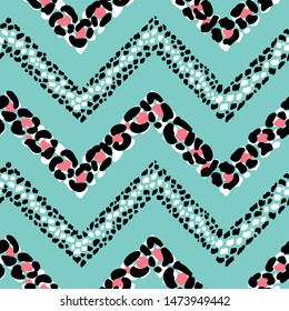 Leopard Print Chevron Seamless Pattern. Hand Drawn Doodle Animal Skin Spots. Vector Abstract Zig zag Striped Background.