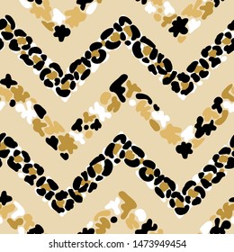 Leopard Print Chevron Seamless Pattern. Hand Drawn Doodle Animal Skin Spots. Vector Abstract Zig zag Striped  Golden Black Colors Background.